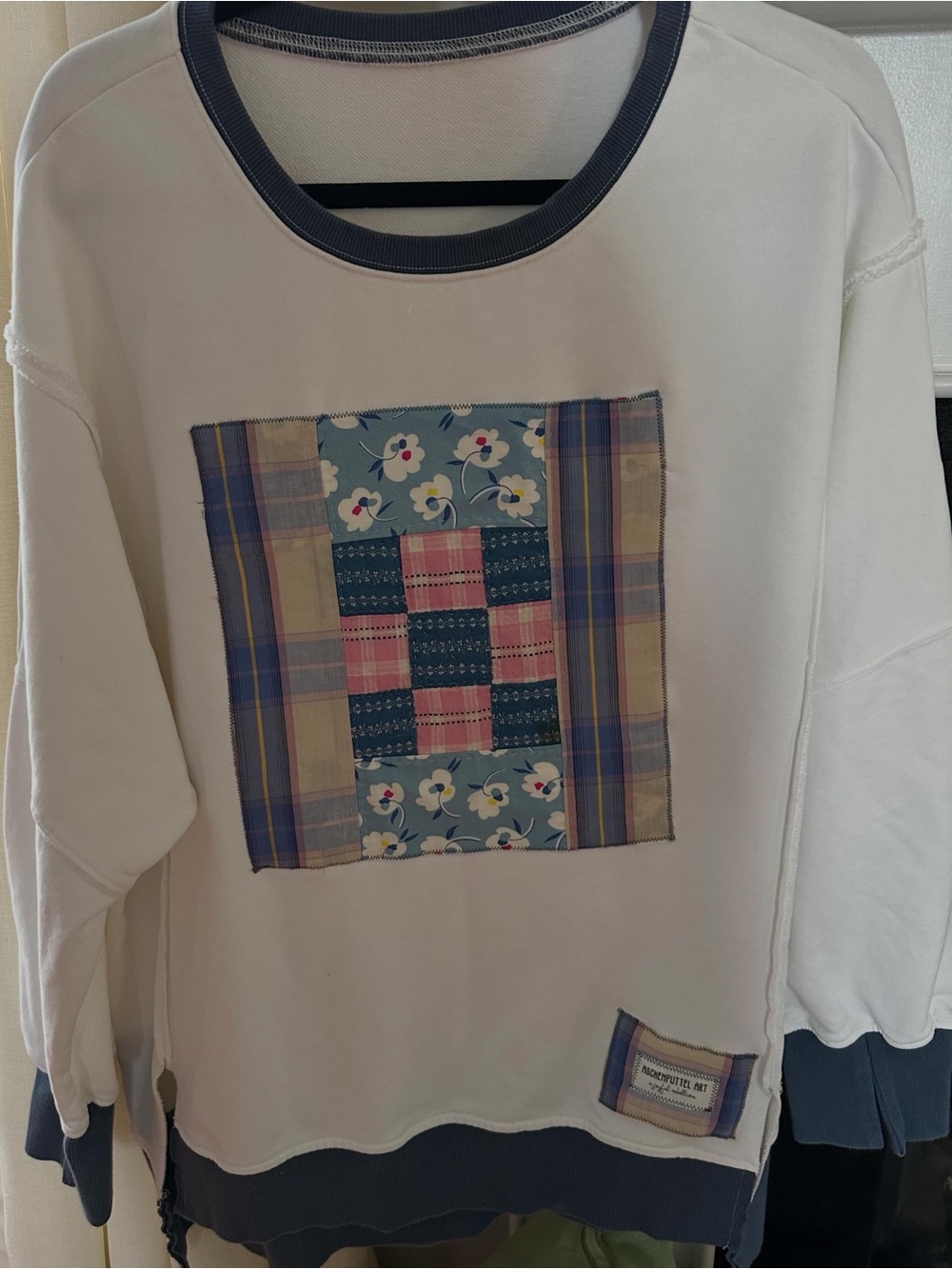 White Pullover Sweatshirt with Blue and pink Patchwork appliqué